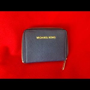 Michael Kors Wallet, 4 x 5. In excellent condition.